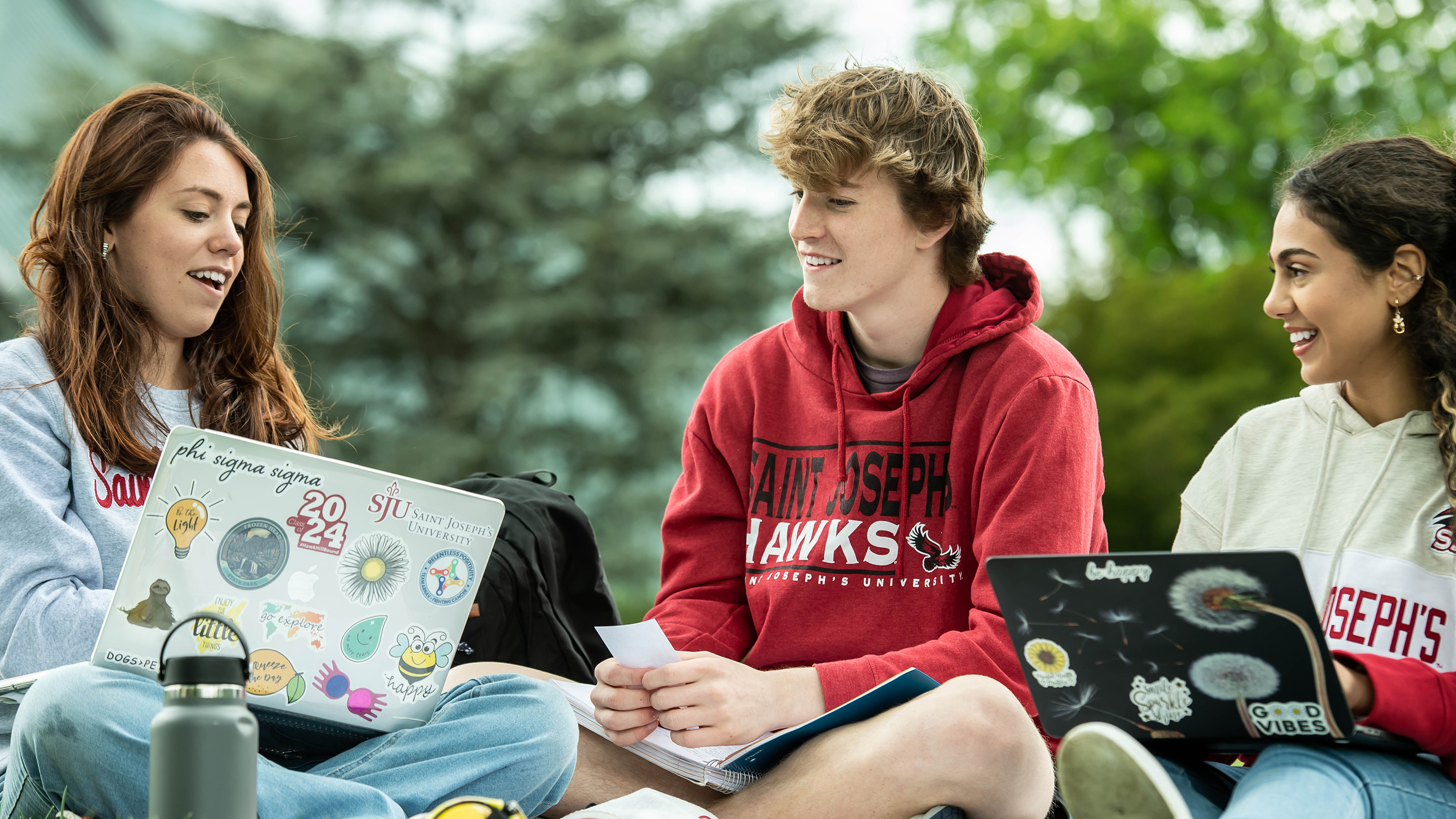 Students studying on laptops at Saint Joseph's University